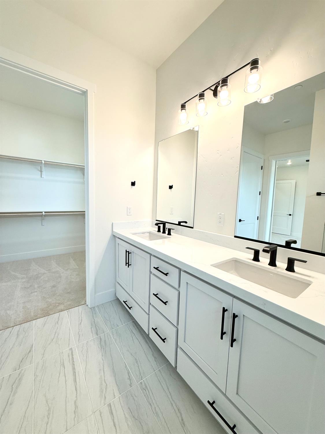 7056 Dalton Rnch Drive Rancho Murieta, CA 95683 - Photo 20 of 29 a spacious bathroom with a double vanity sink mirror and