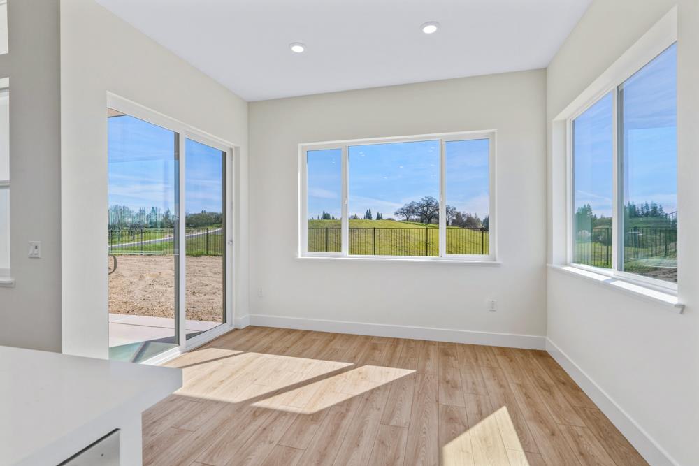 7056 Dalton Rnch Drive Rancho Murieta, CA 95683 - Photo 21 of 29 a bed sitting in a room next to a window