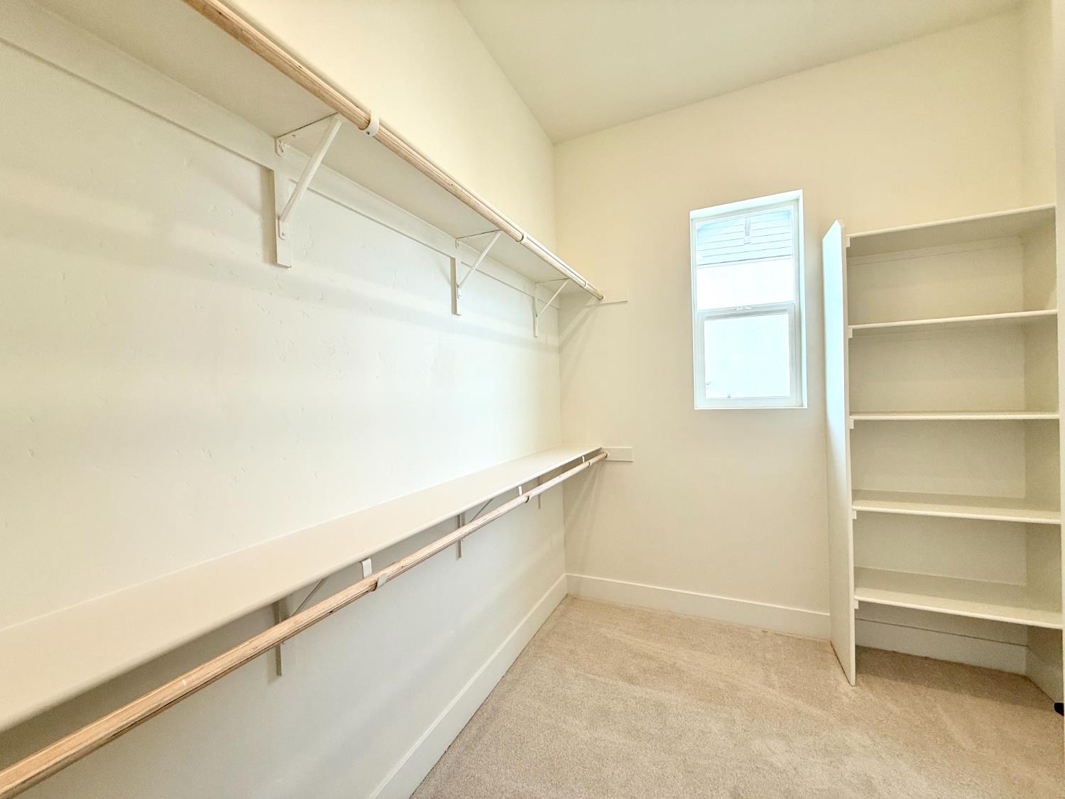 7056 Dalton Rnch Drive Rancho Murieta, CA 95683 - Photo 22 of 29 a view of an empty walk in closet