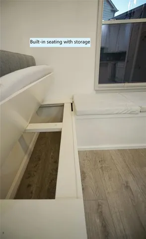 a bathroom with a double vanity sink and mirror