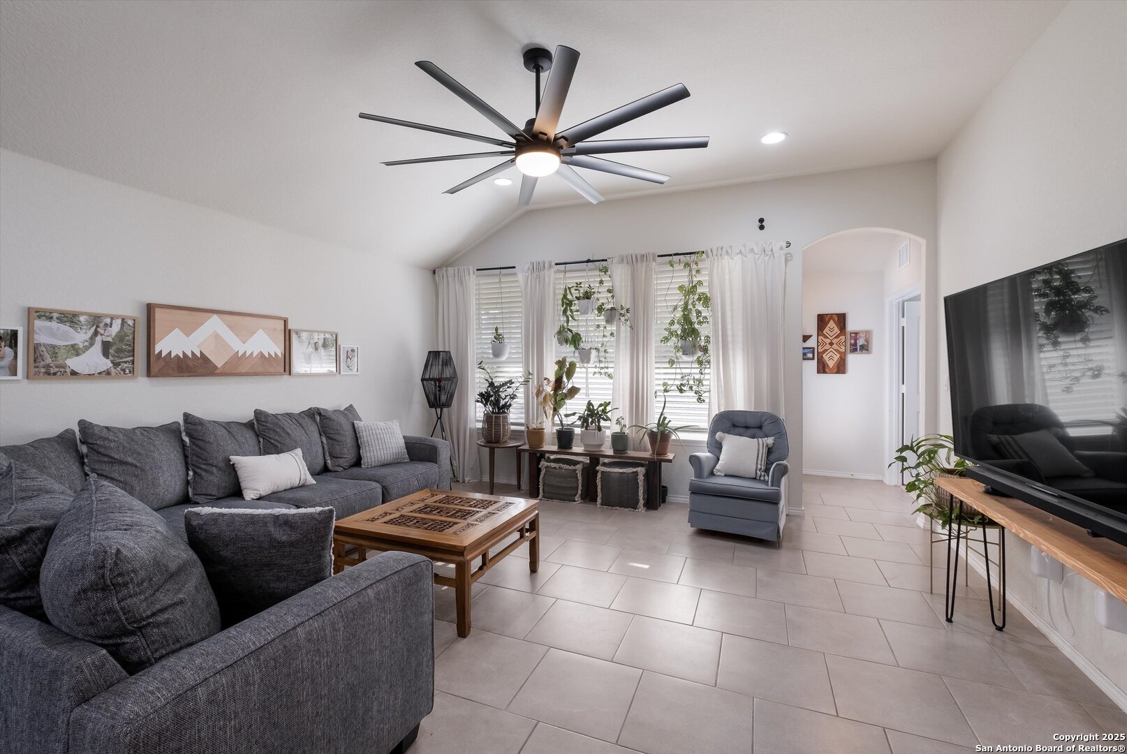 9029 Curling Post Schertz, TX 78154 - Photo 12 of 53 a living room with furniture and a flat screen tv
