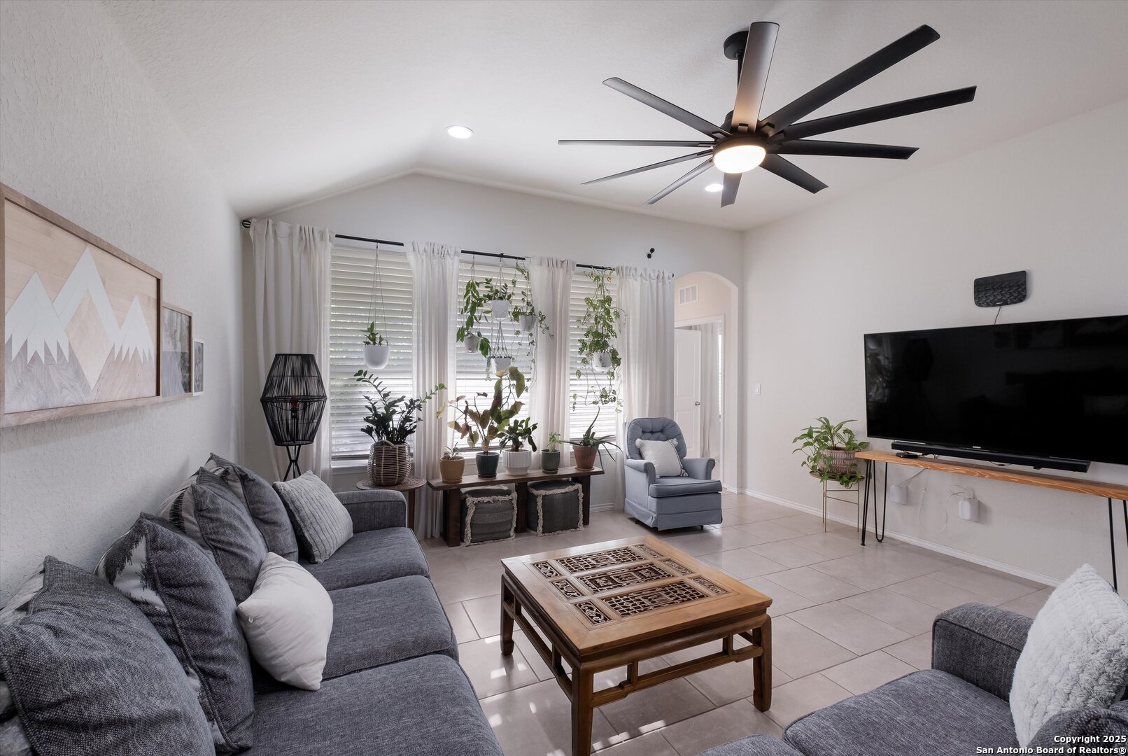 9029 Curling Post Schertz, TX 78154 - Photo 13 of 53 a living room with furniture and a flat screen tv