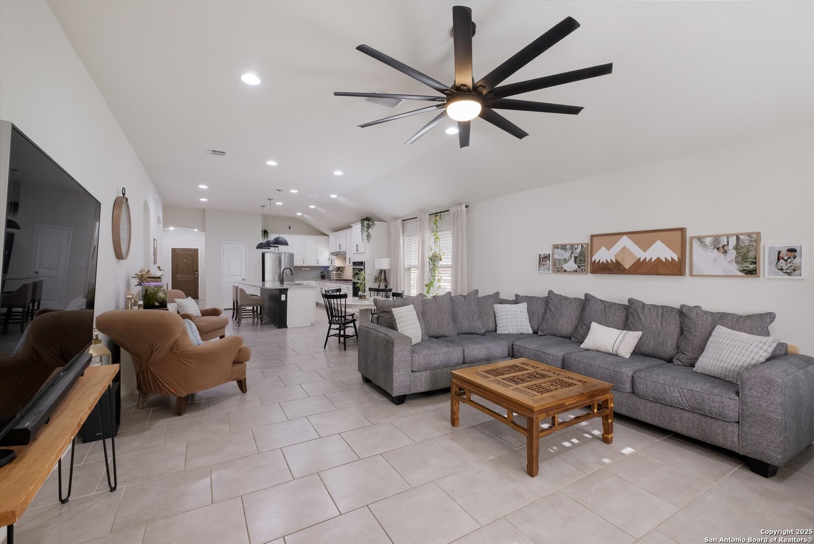 9029 Curling Post Schertz, TX 78154 - Photo 14 of 53 a living room with furniture a ceiling fan and a window