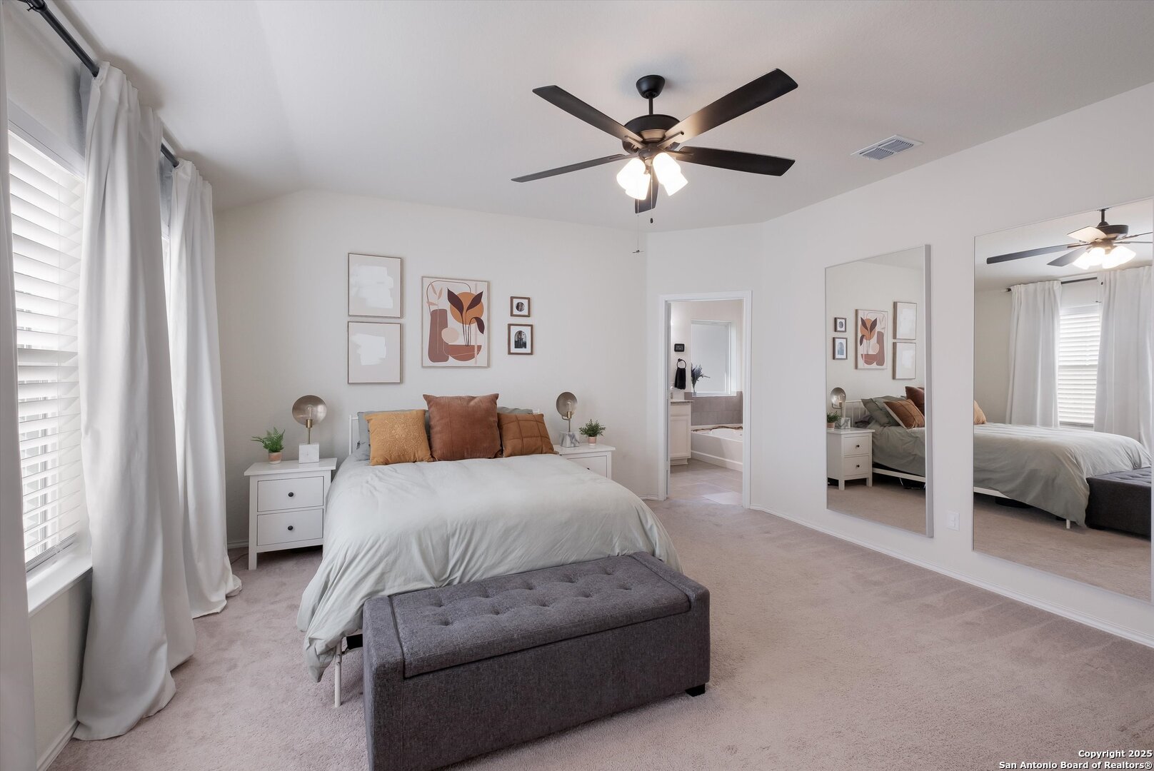 9029 Curling Post Schertz, TX 78154 - Photo 16 of 53 a spacious bedroom with a bed and a large window