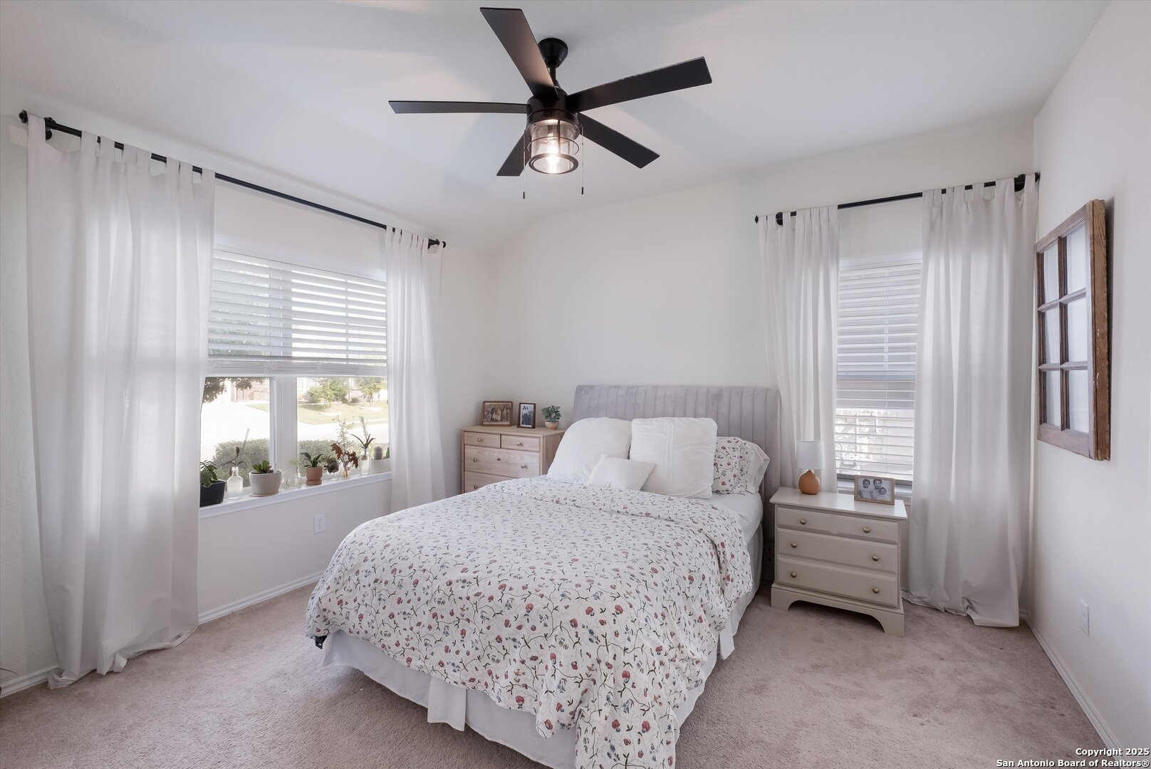 9029 Curling Post Schertz, TX 78154 - Photo 22 of 53 a bedroom with a bed next to a window
