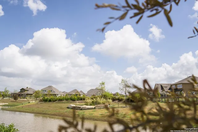 a view of swimming pool with a yard
