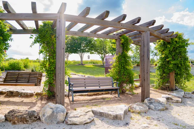 a view of a garden and lake