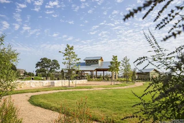 a view of swimming pool with a yard