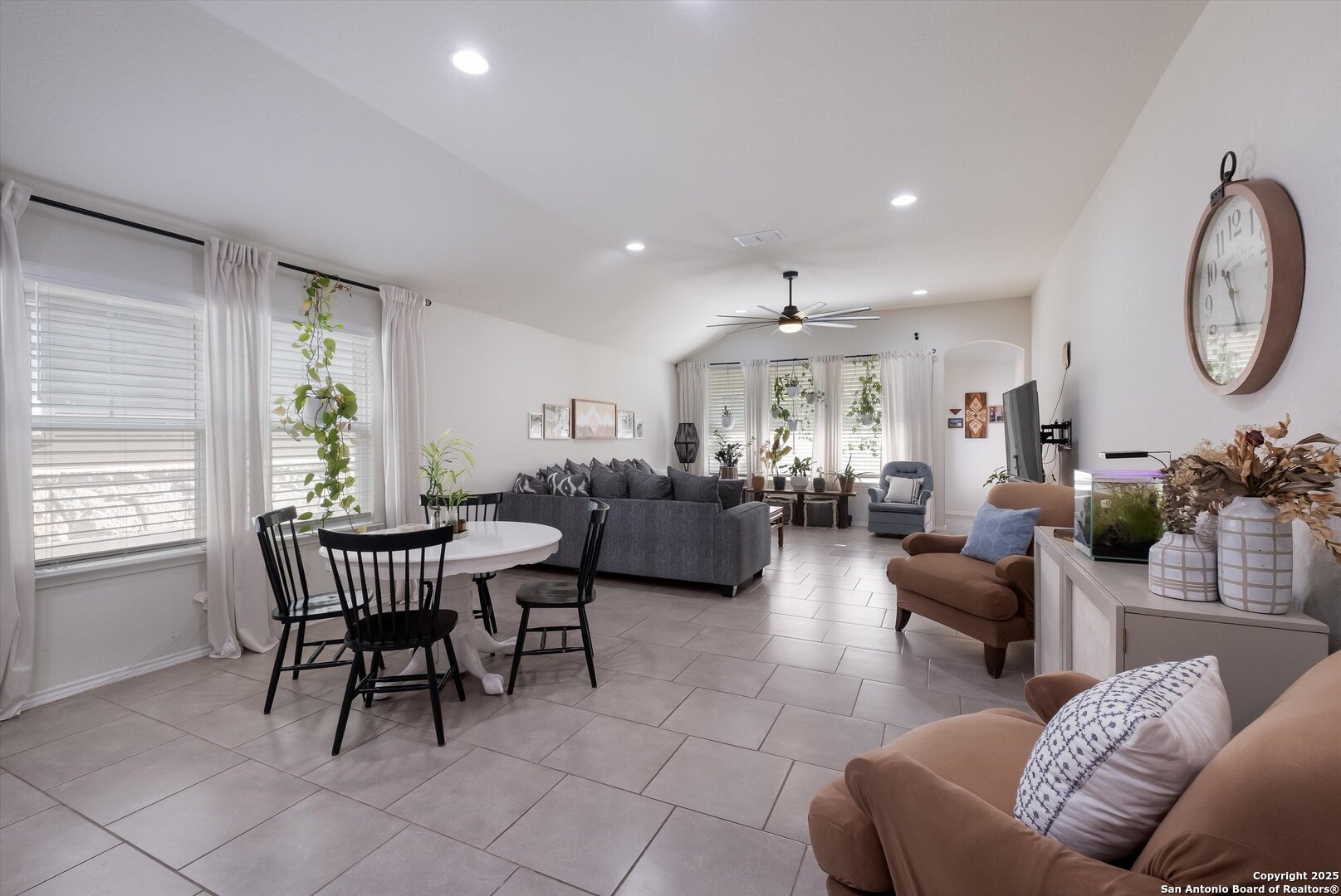 9029 Curling Post Schertz, TX 78154 - Photo 10 of 53 a living room with furniture two window and a table