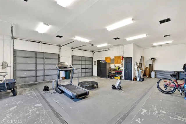 an aerial view of residential houses and outdoor space