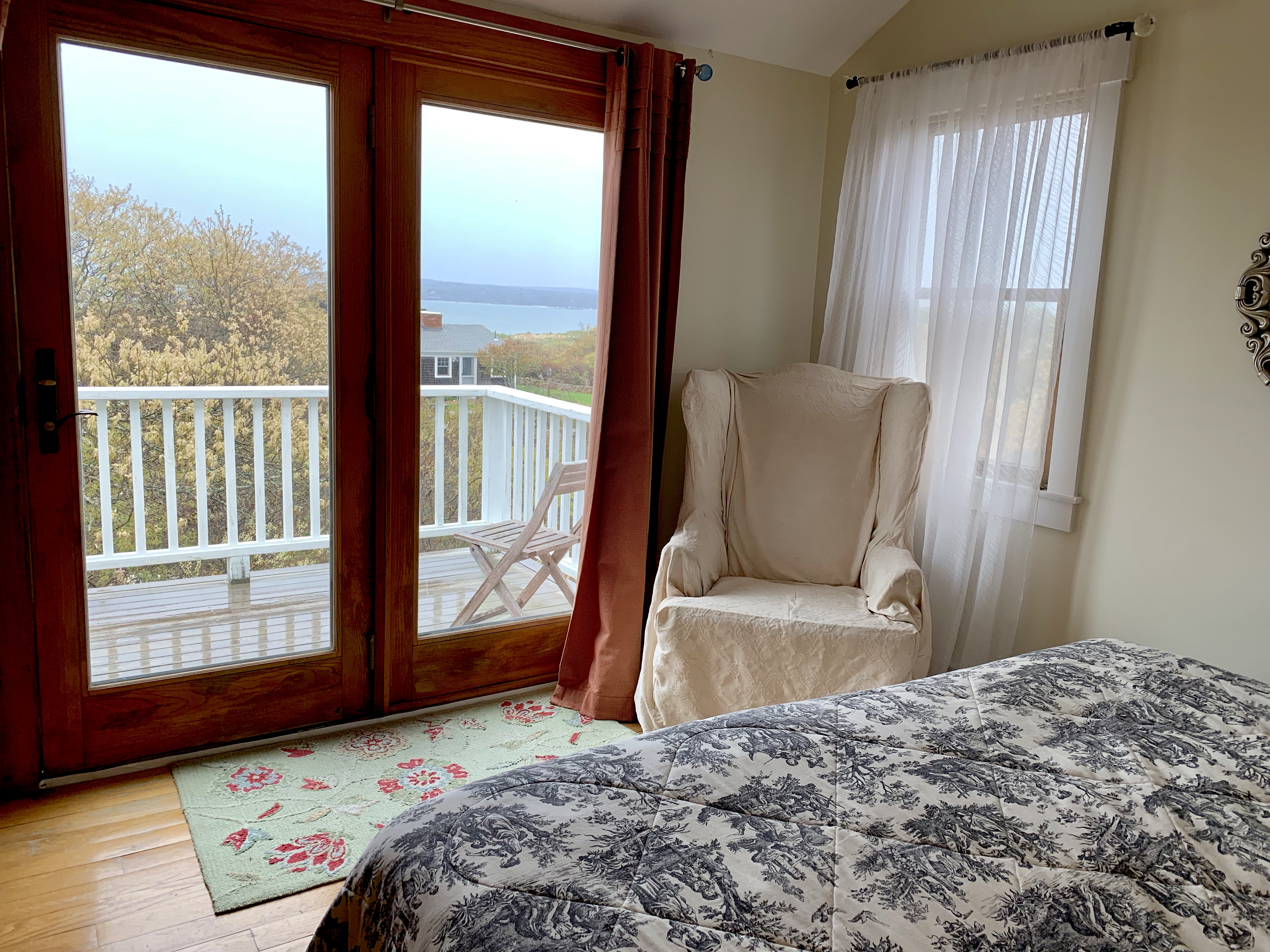 650 Lighthouse Road Aquinnah, MA 02535 - Photo 22 of 57 Bedroom upstairs. Enjoy a view of the sound right from your bed.