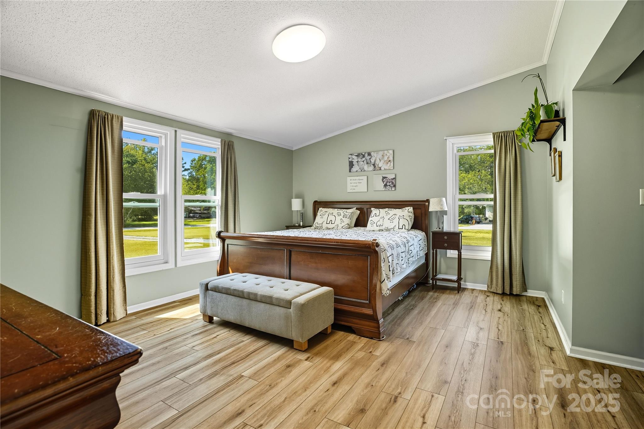 1660 Lentz Road China Grove, NC 28023 - Photo 17 of 44 a bedroom with a bed and a wooden floor