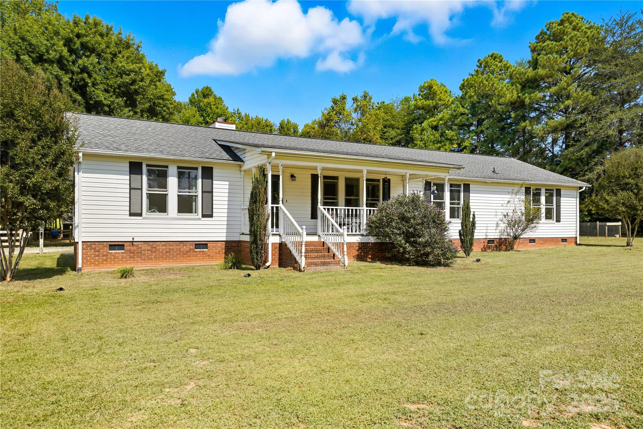 1660 Lentz Road China Grove, NC 28023 - Photo 2 of 44 a view of a house with a swimming pool
