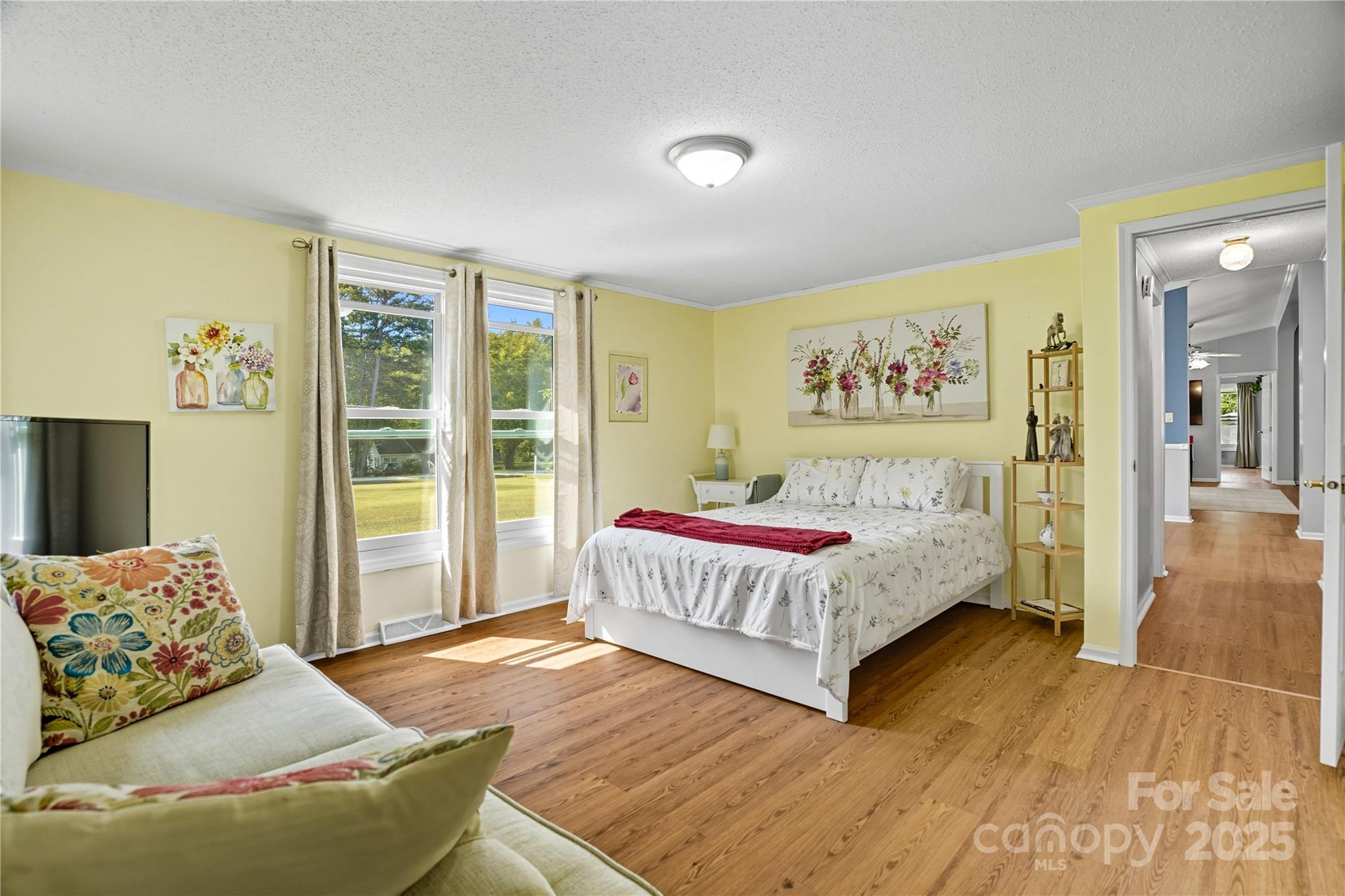 1660 Lentz Road China Grove, NC 28023 - Photo 22 of 44 a bedroom with a bed and a couch