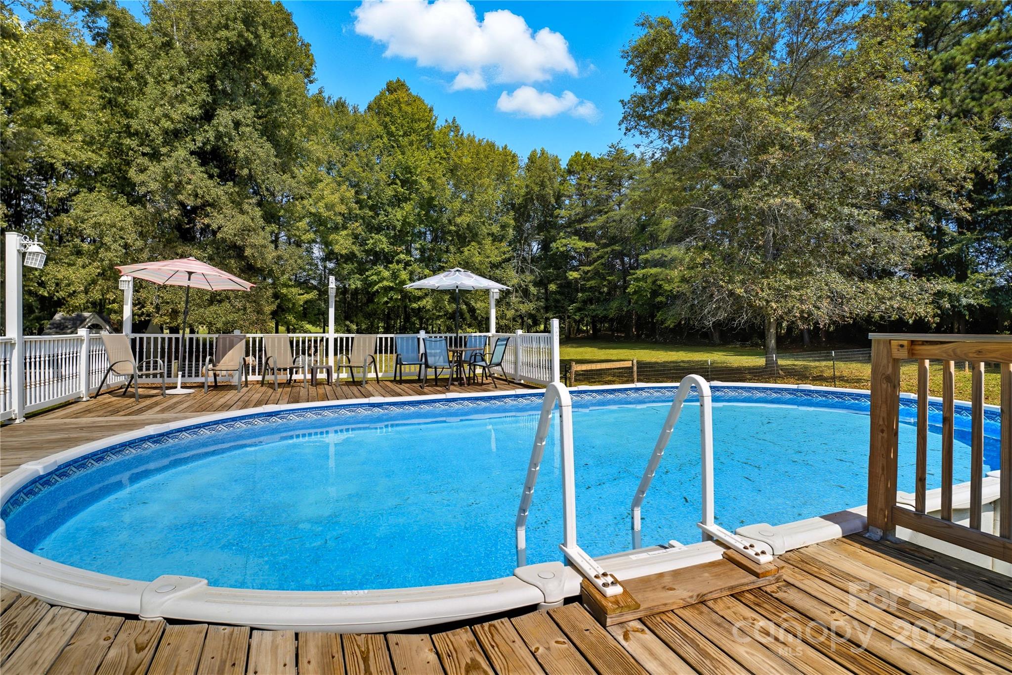 1660 Lentz Road China Grove, NC 28023 - Photo 31 of 44 a view of a swimming pool with a patio