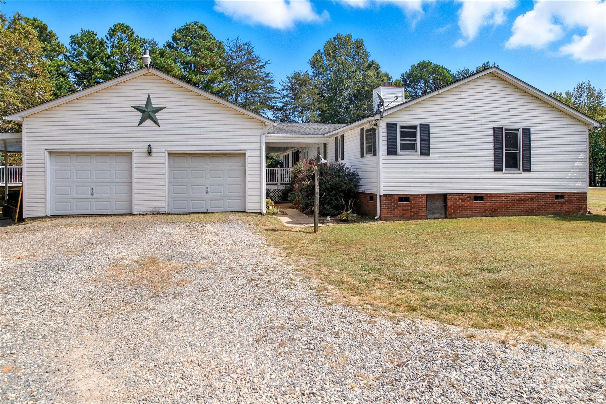 1660 Lentz Road China Grove, NC 28023 - Photo 33 of 44 a front view of house with yard and trees in the background