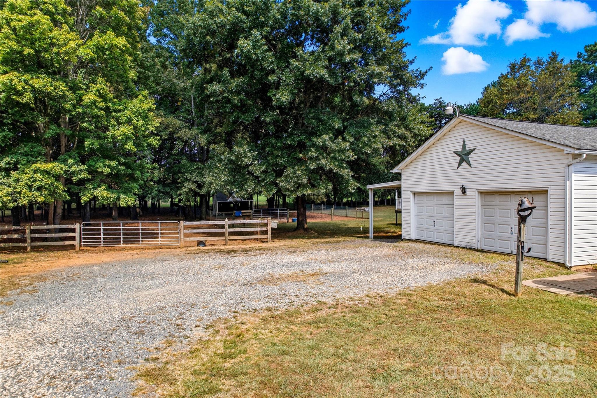 1660 Lentz Road China Grove, NC 28023 - Photo 35 of 44 a view of a house with backyard and a tree