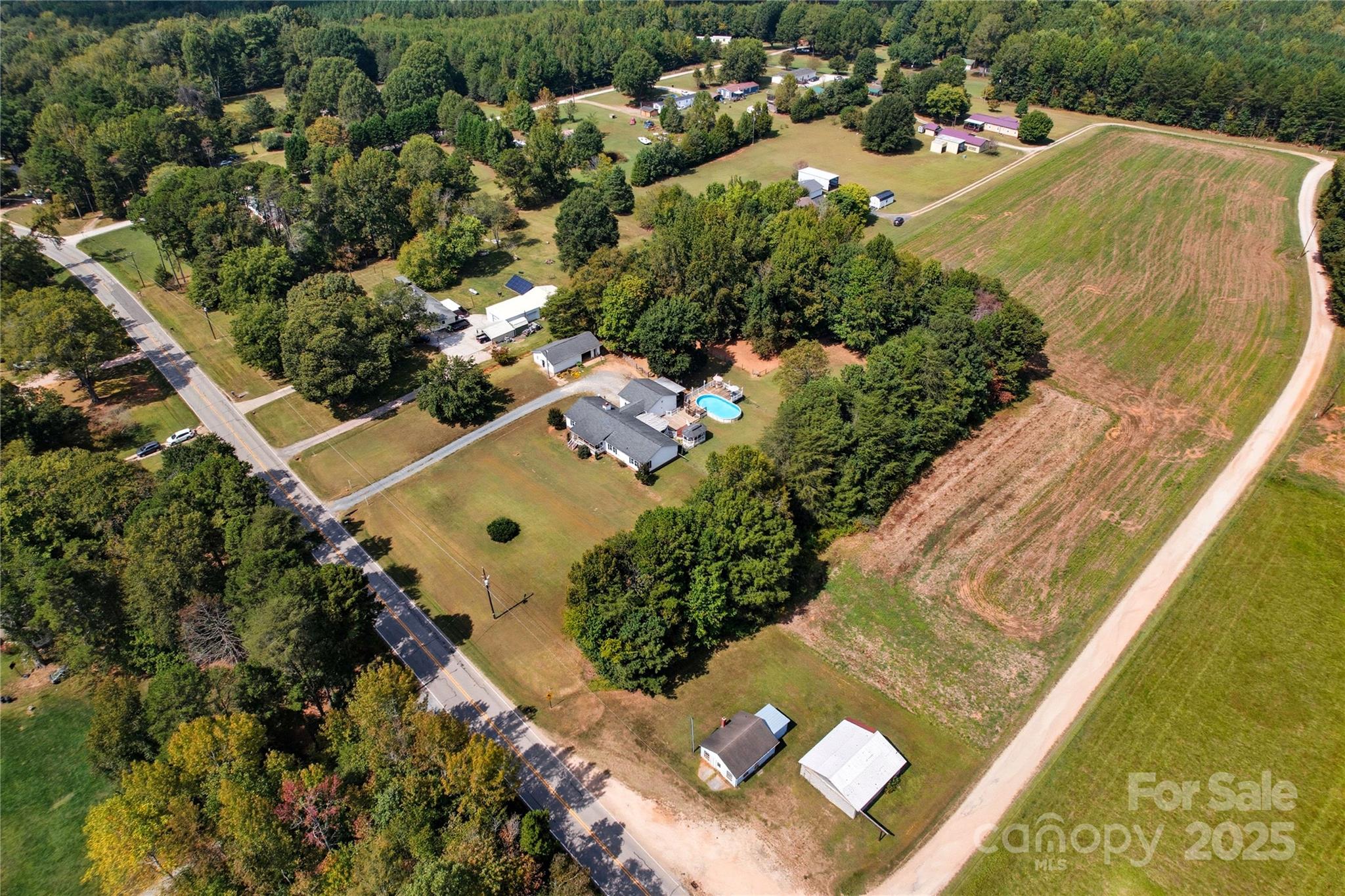 1660 Lentz Road China Grove, NC 28023 - Photo 5 of 44 an aerial view of a residential houses with yard