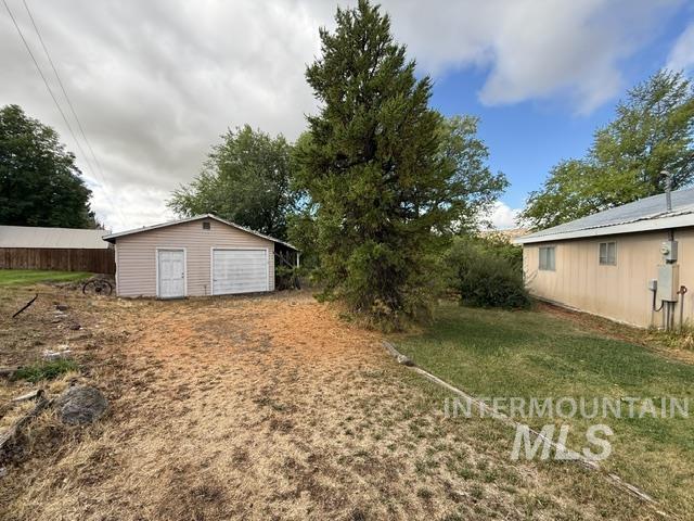 555 Cemetery Road Cambridge, ID 83610 - Photo 21 of 41 Detached garage with siding exterior and two garage doors
