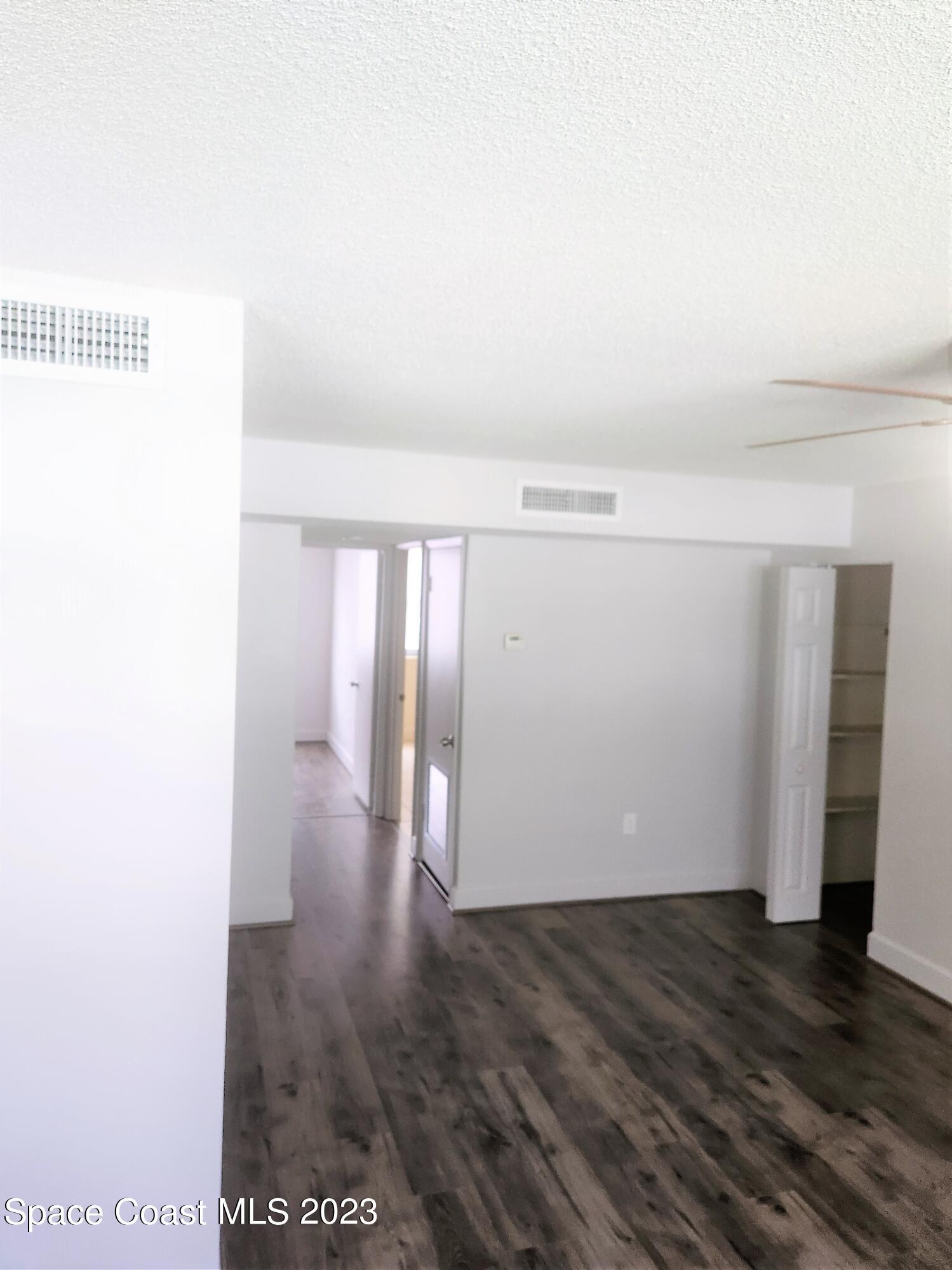 8401 North Atlantic Avenue, Unit K9 Cape Canaveral, FL 32920 - Photo 8 of 14 a view of an empty room