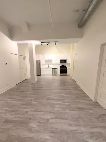 a view of a kitchen with a sink