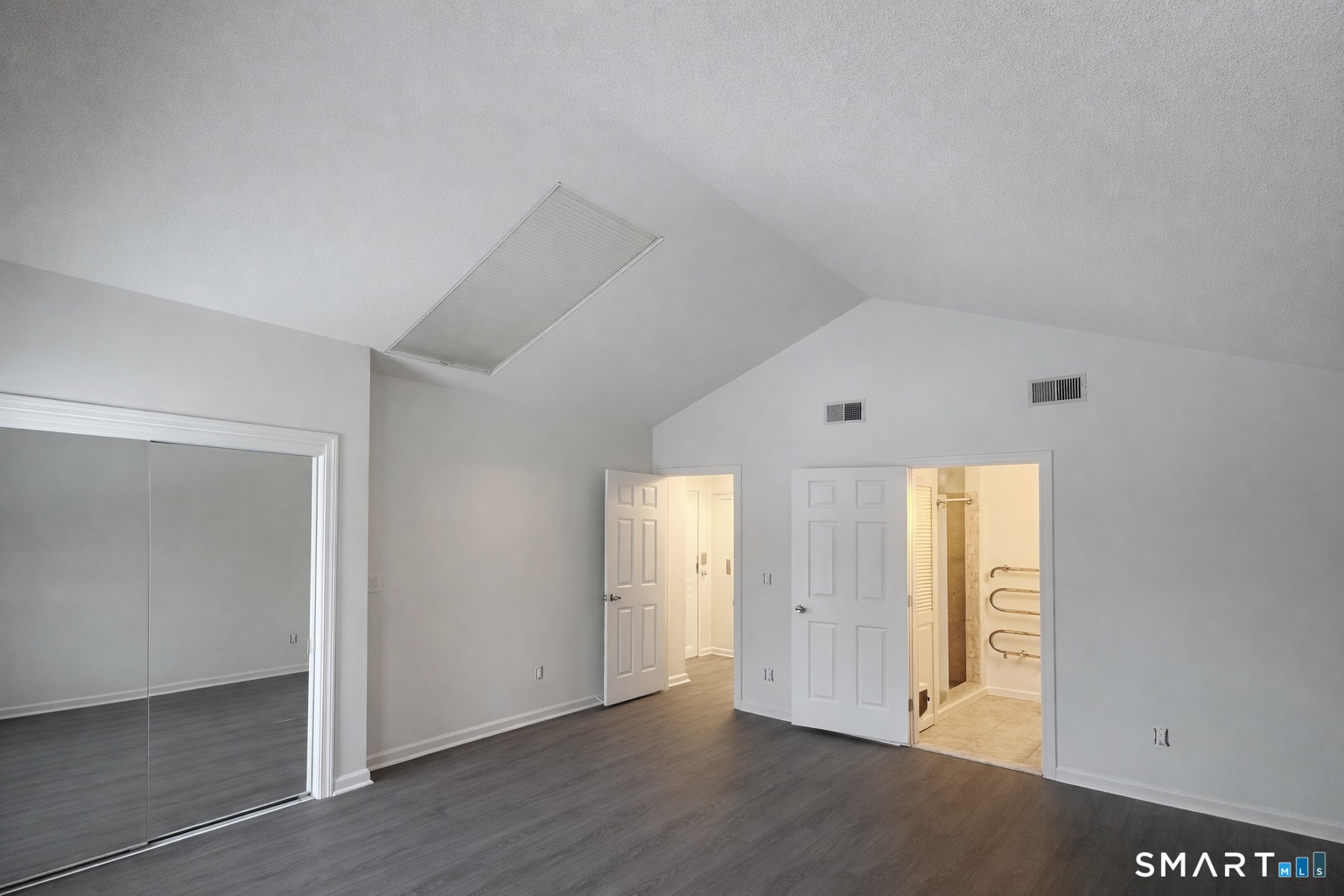 44 Hard Street, Unit 4 New Haven, CT 06515 - Photo 8 of 14 a view of an empty room with wooden floor and closet