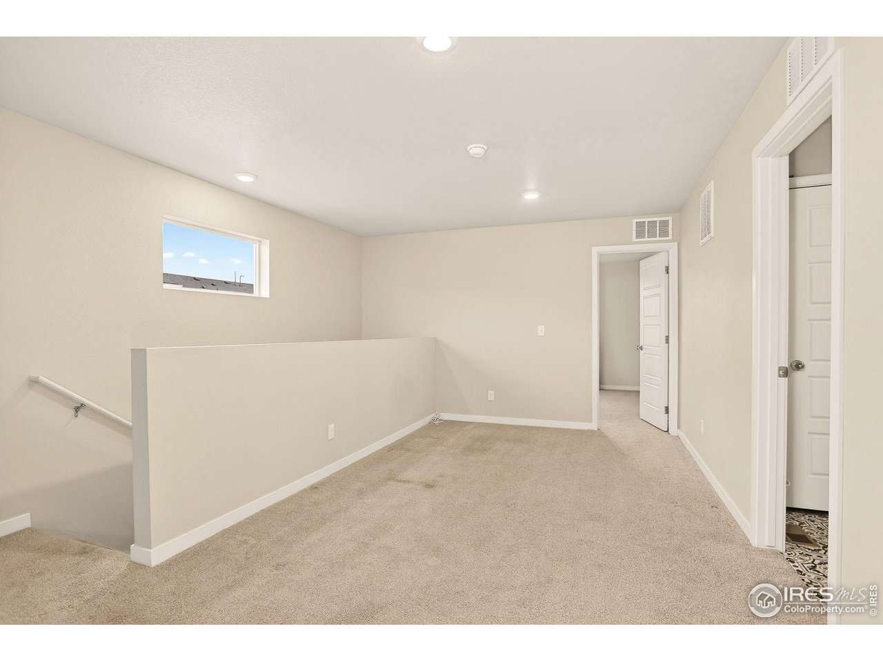 307 Penguin Street Johnstown, CO 80534 - Photo 21 of 34 Roomy loft that can be used as an office, reading nook or additional living area