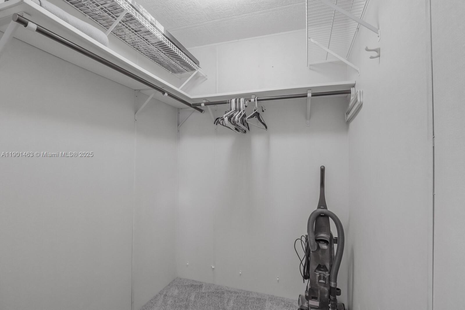 8191 Southeast Homestead Avenue, Unit 8191 Hobe Sound, FL 33455 - Photo 27 of 38 a close view of closet