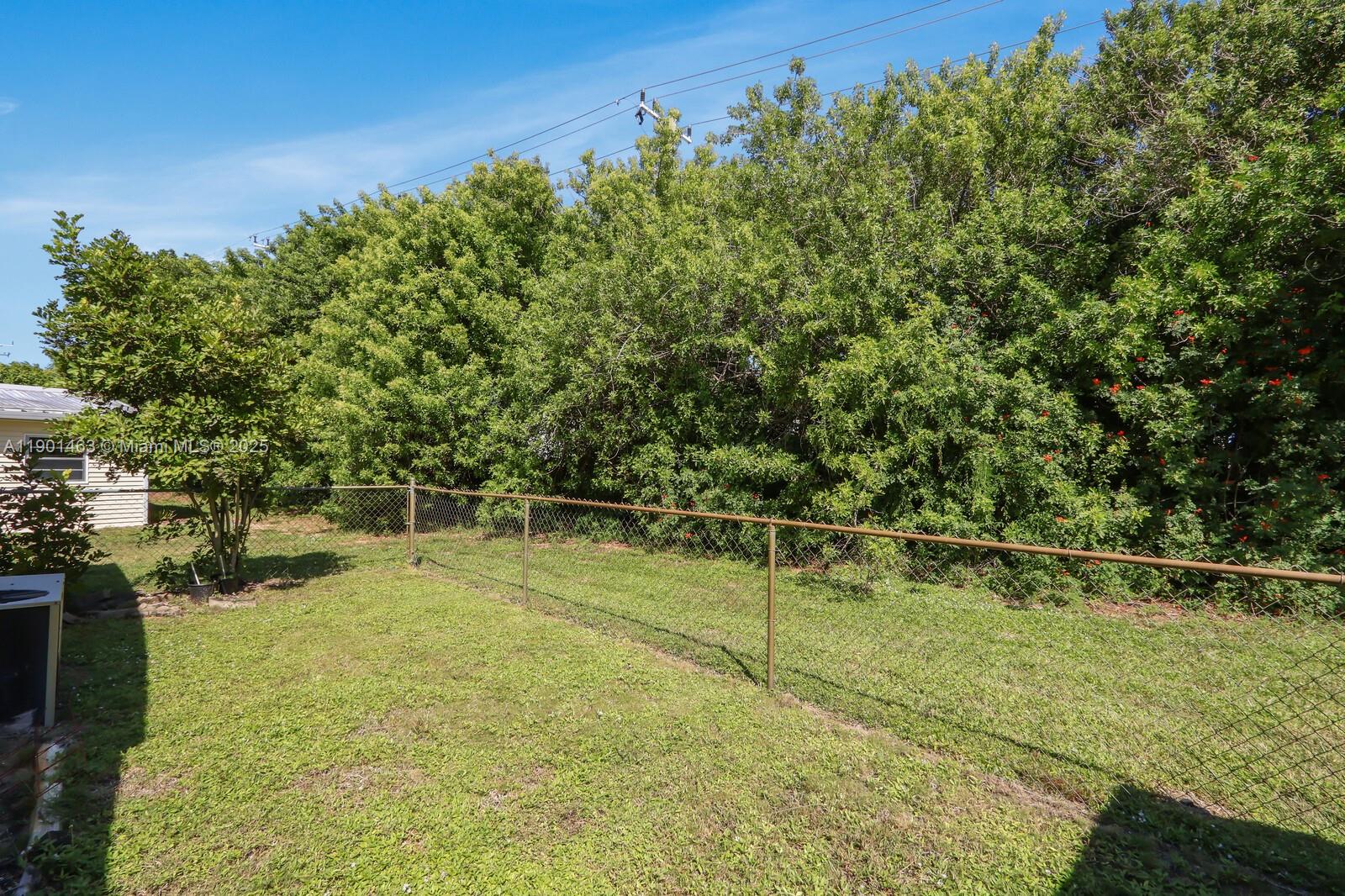 8191 Southeast Homestead Avenue, Unit 8191 Hobe Sound, FL 33455 - Photo 32 of 38 a view of a basket ball ground