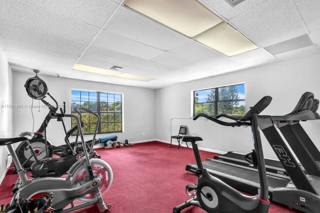 a view of a room with gym equipment