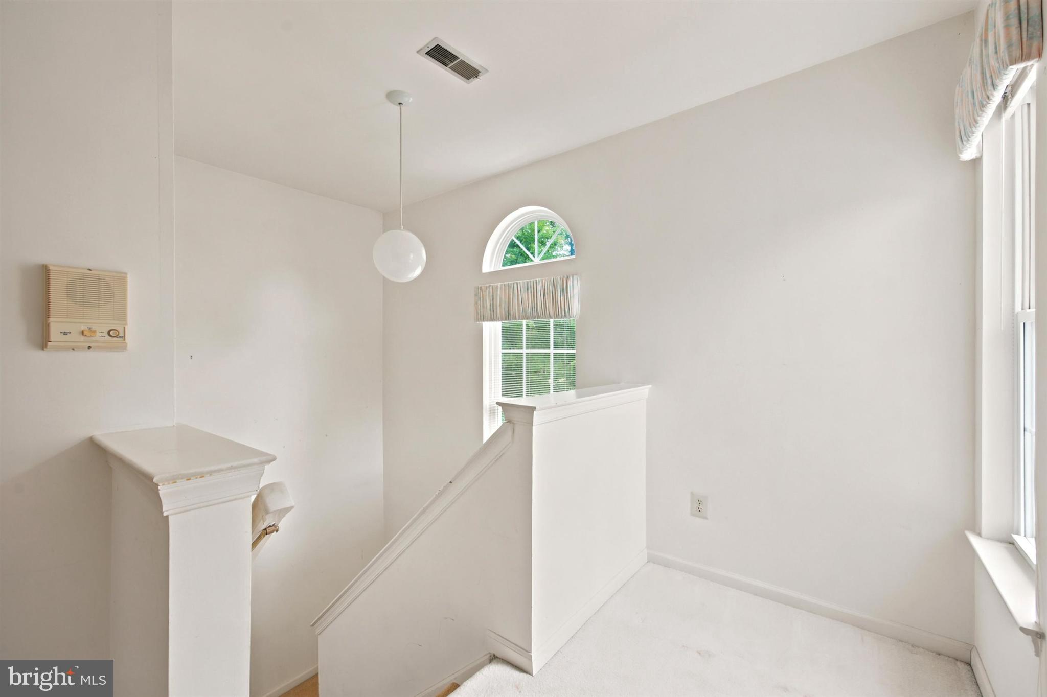 1652 Covington Road Yardley, PA 19067 - Photo 8 of 15 a view of empty room with window and tub