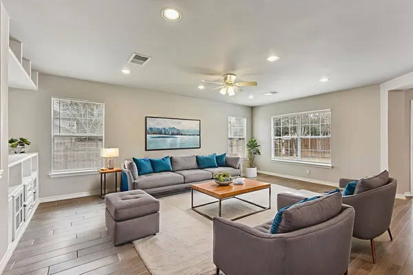 a living room with furniture and a window
