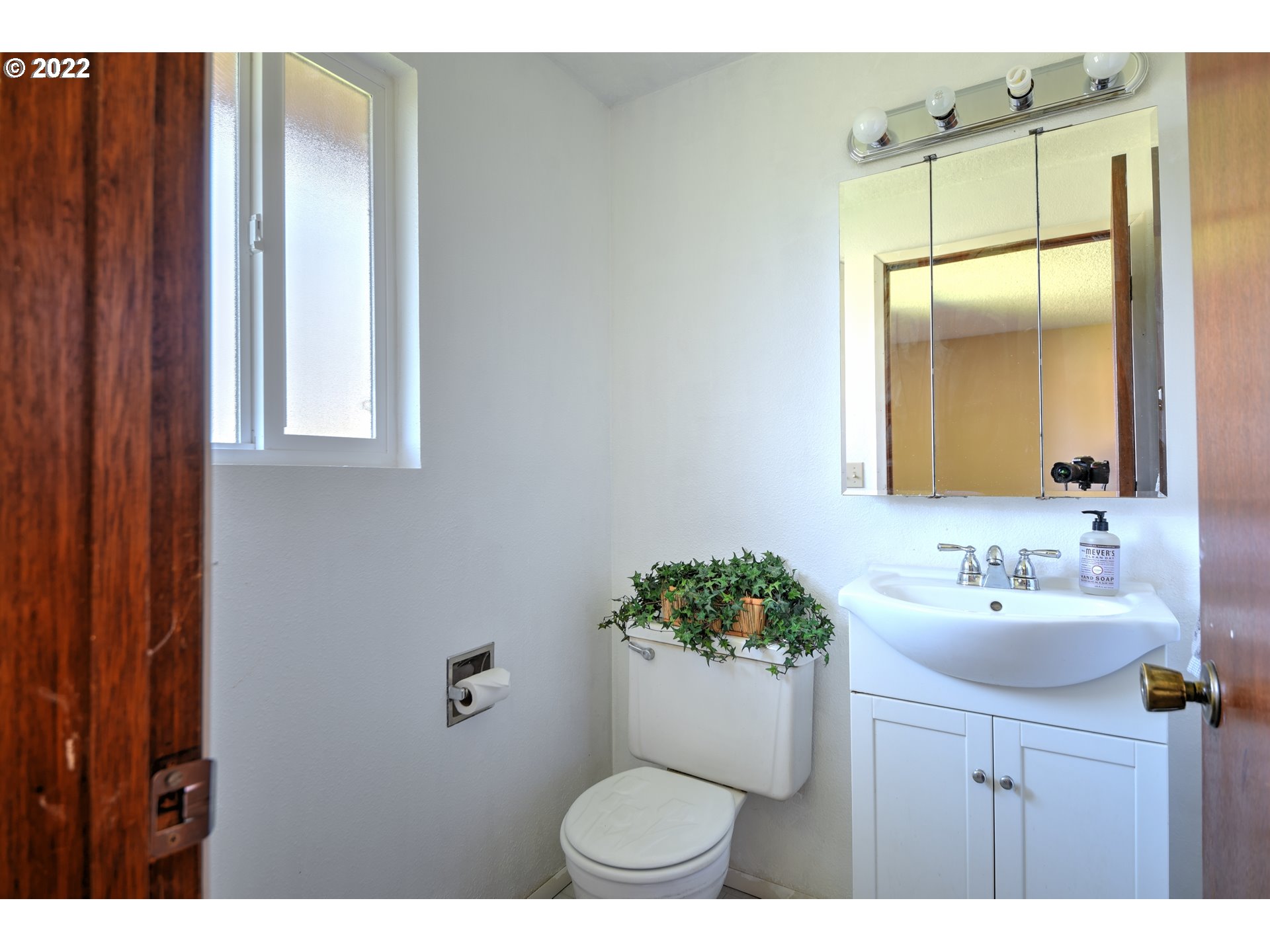 212 72nd Street Springfield, OR 97478 - Photo 15 of 21 a bathroom with a sink toilet and mirror