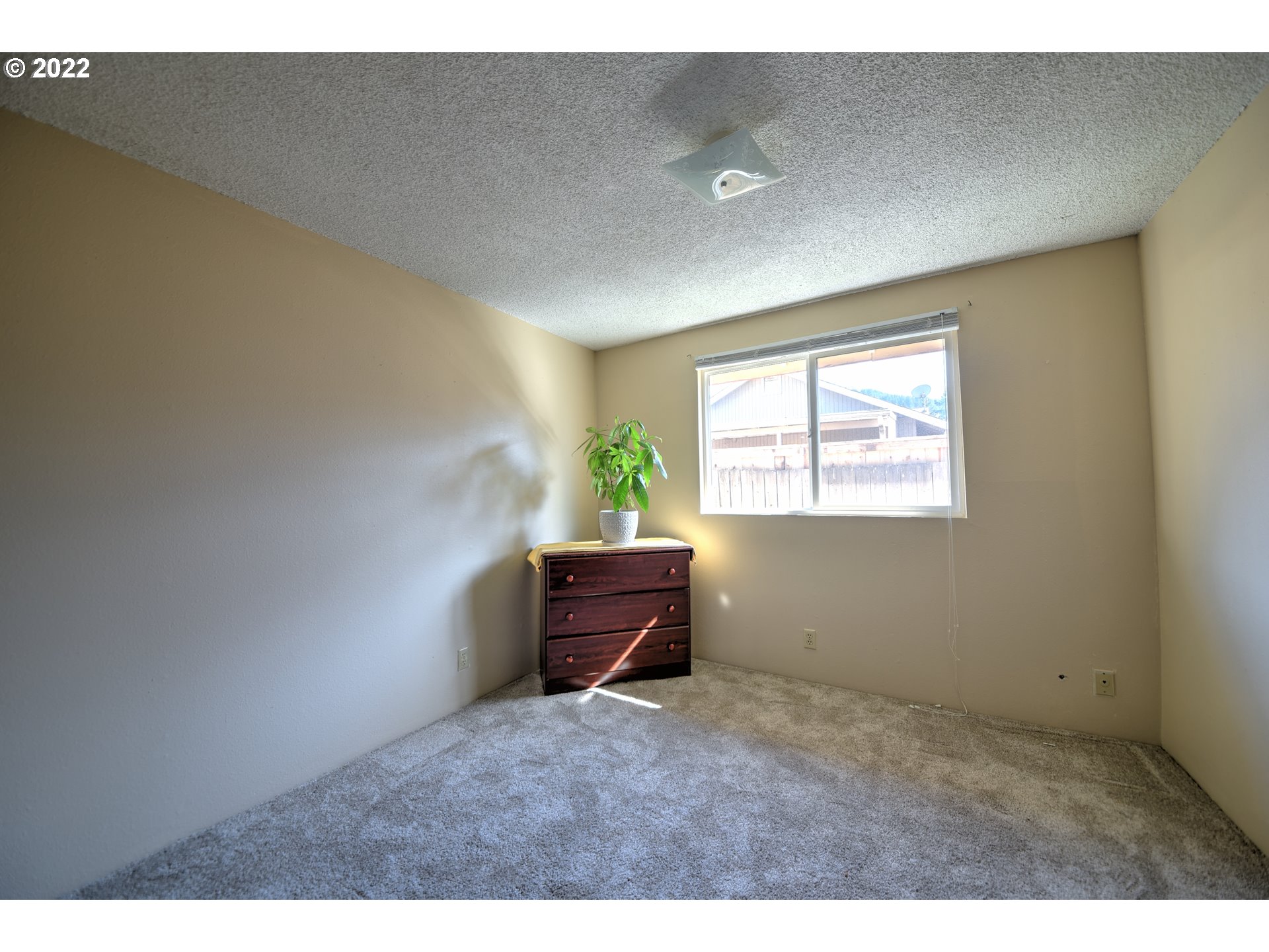 212 72nd Street Springfield, OR 97478 - Photo 16 of 21 a view of an empty room and window