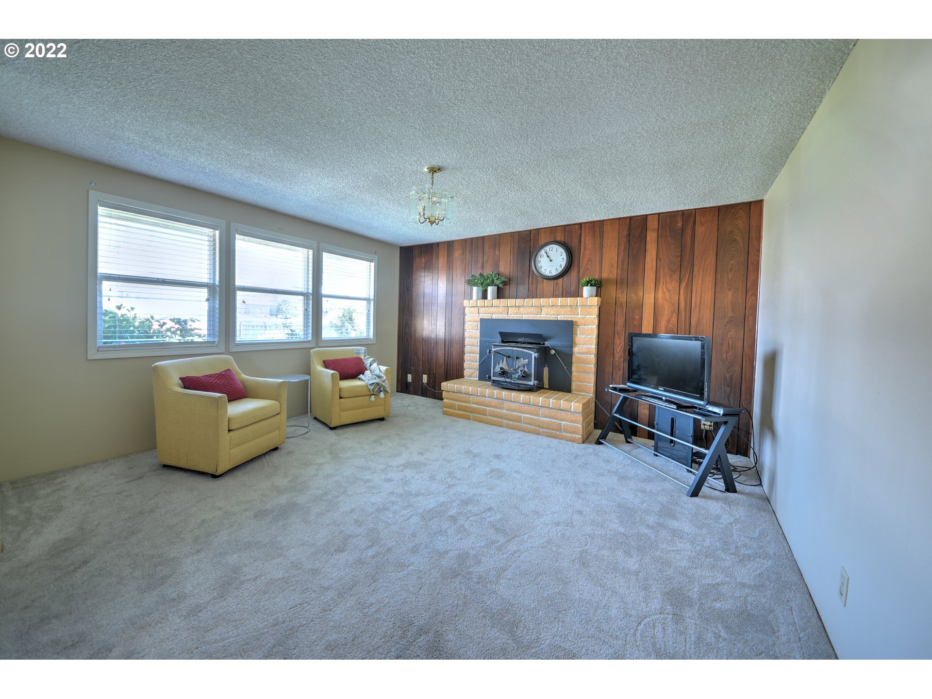 212 72nd Street Springfield, OR 97478 - Photo 3 of 21 a living room with furniture and a fireplace