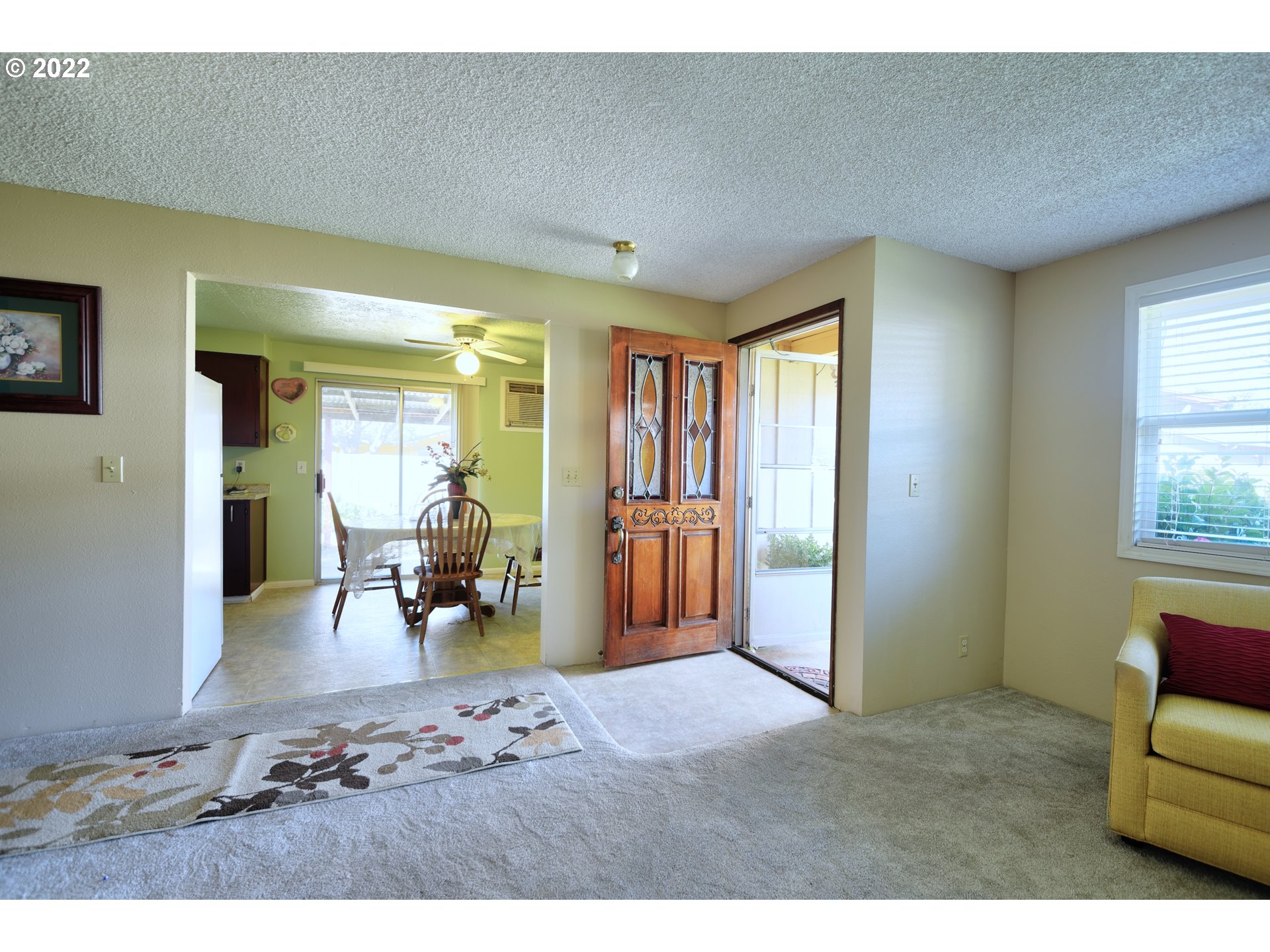 212 72nd Street Springfield, OR 97478 - Photo 5 of 21 a bedroom with furniture and a window
