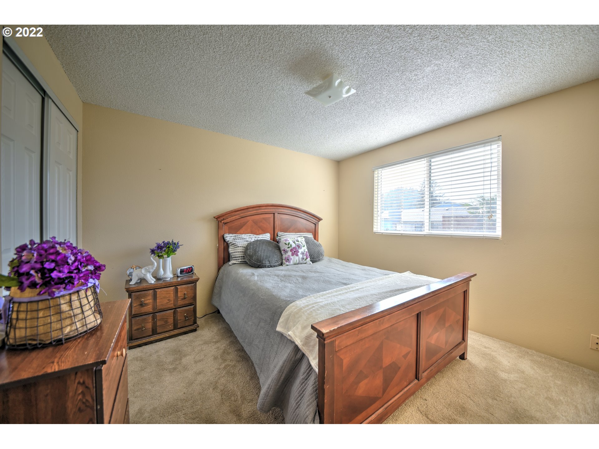 212 72nd Street Springfield, OR 97478 - Photo 10 of 21 a bedroom with a bed and a dresser