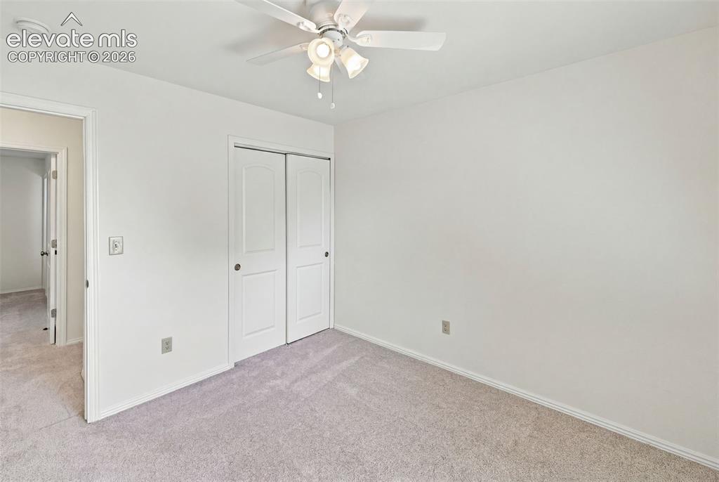 1239 Suncrest Way Colorado Springs, CO 80906 - Photo 36 of 46 Bedroom 3 - main level