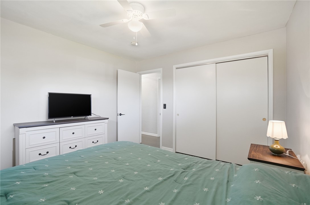 1325 Chelsea Road Troy, OH 45373 - Photo 21 of 42 This spacious bedroom offers ample storage with a large closet and an inviting atmosphere.