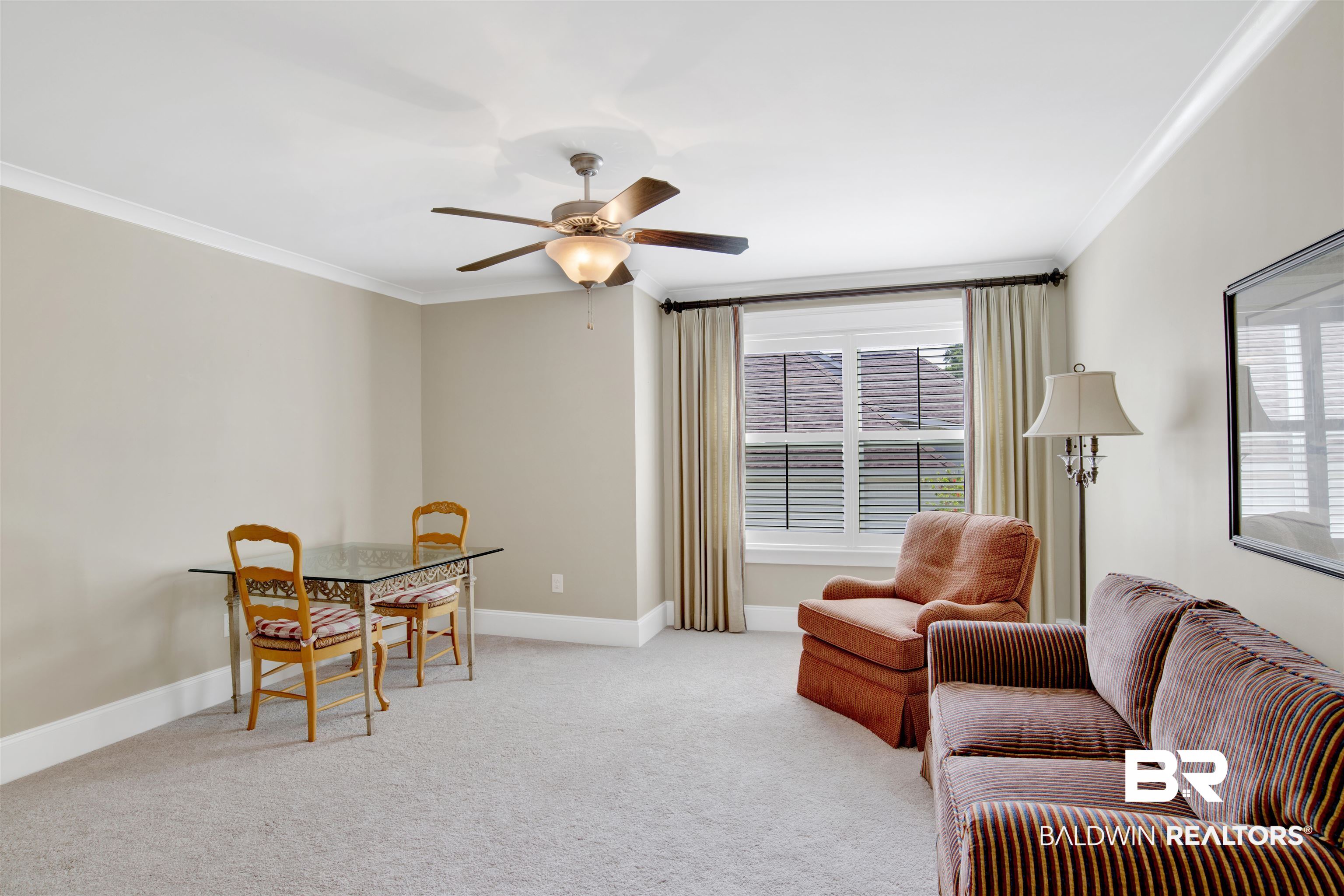 131 Sedgefield Avenue Fairhope, AL 36532 - Photo 33 of 50 Upstairs bedroom featuring ceiling fan, light carpet, and ornamental molding
