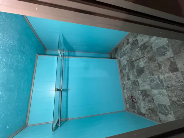 a house with swimming pool in front of it