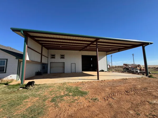 a view of a house with a patio