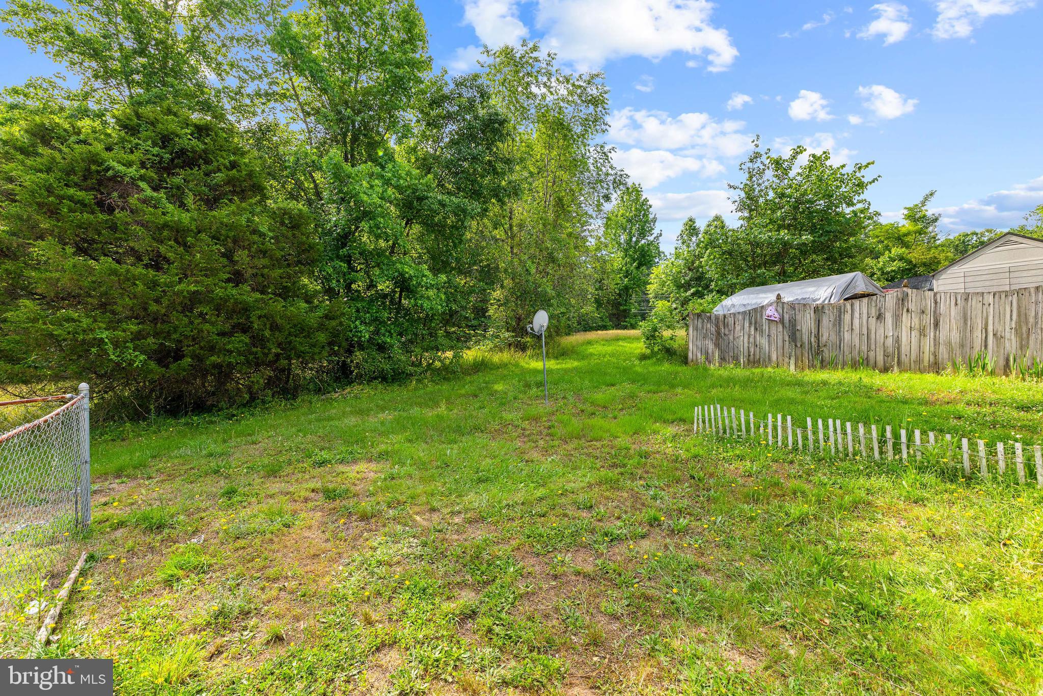 9479 Inaugural Drive King George, VA 22485 - Photo 23 of 26 a view of garden with deck in the back