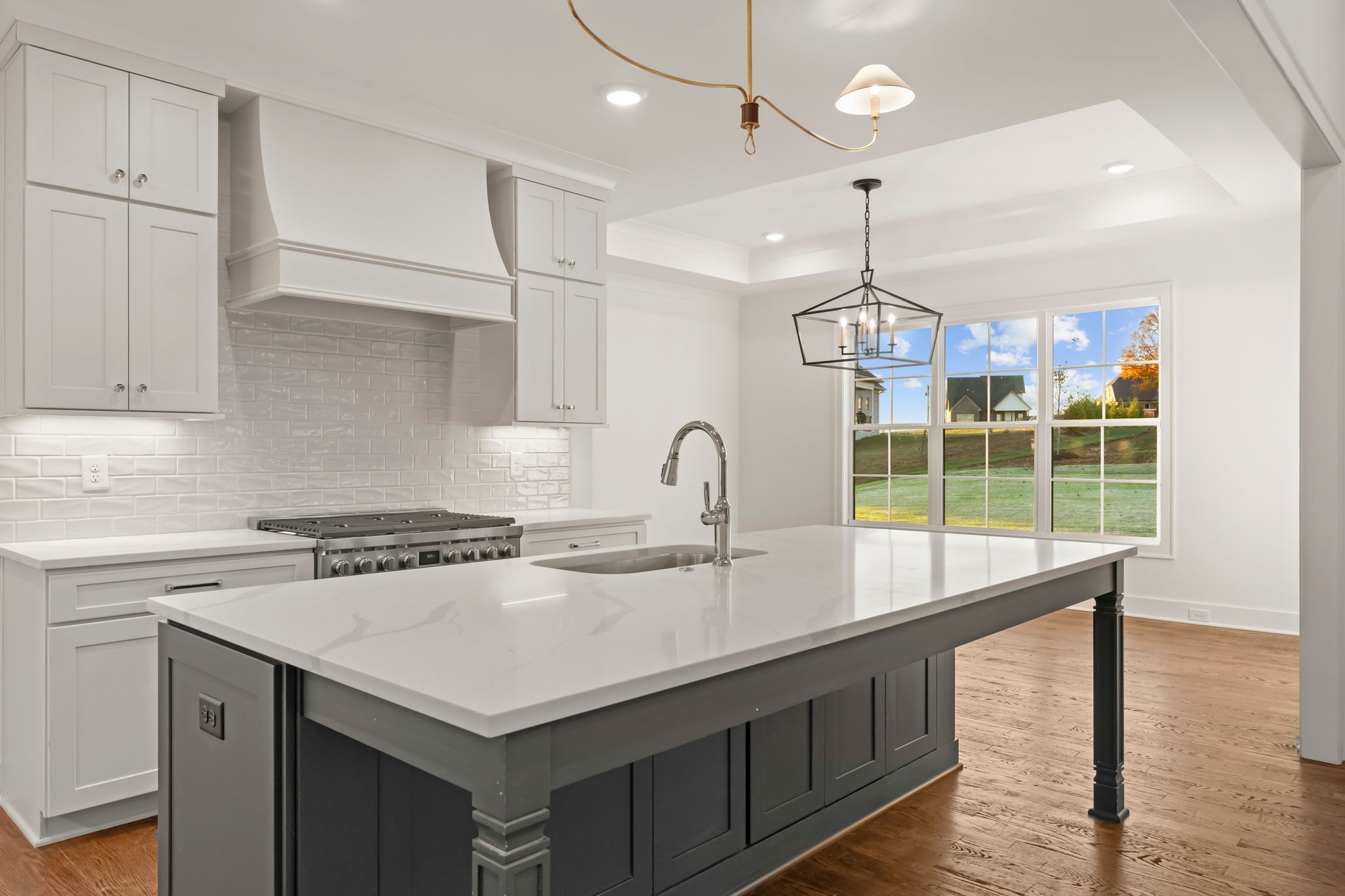 307 Oak Street Lebanon, TN 37087 - Photo 13 of 46 a kitchen with a sink a counter space and cabinets