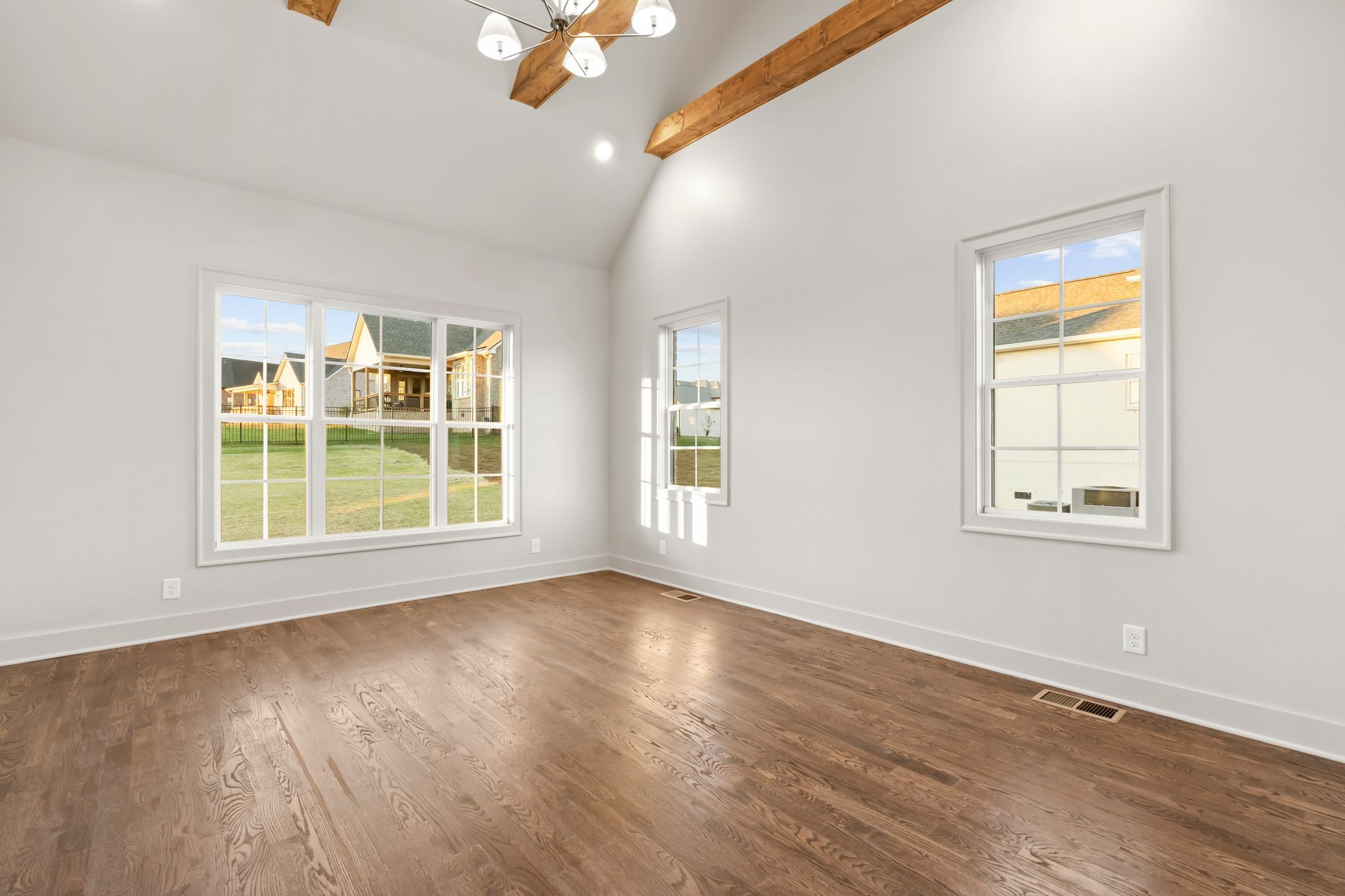 307 Oak Street Lebanon, TN 37087 - Photo 26 of 46 a view of an empty room with wooden floor and a window