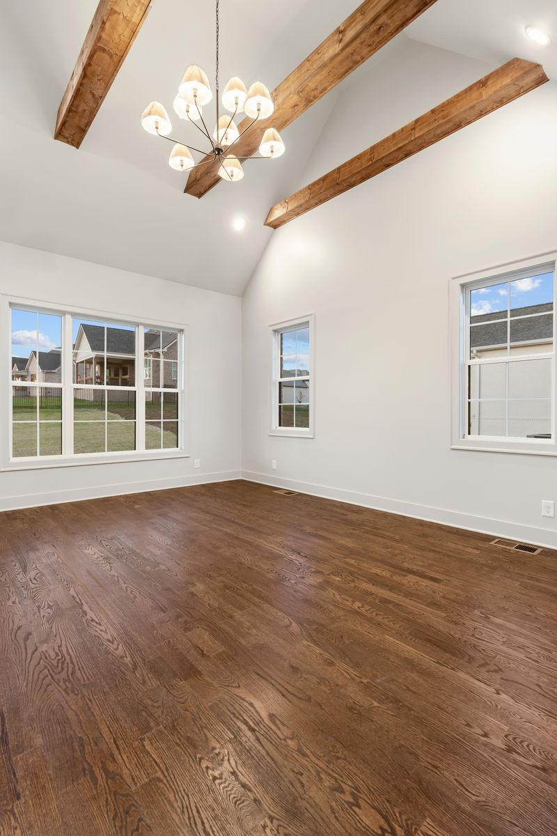307 Oak Street Lebanon, TN 37087 - Photo 27 of 46 a view of an empty room with a window and wooden floor