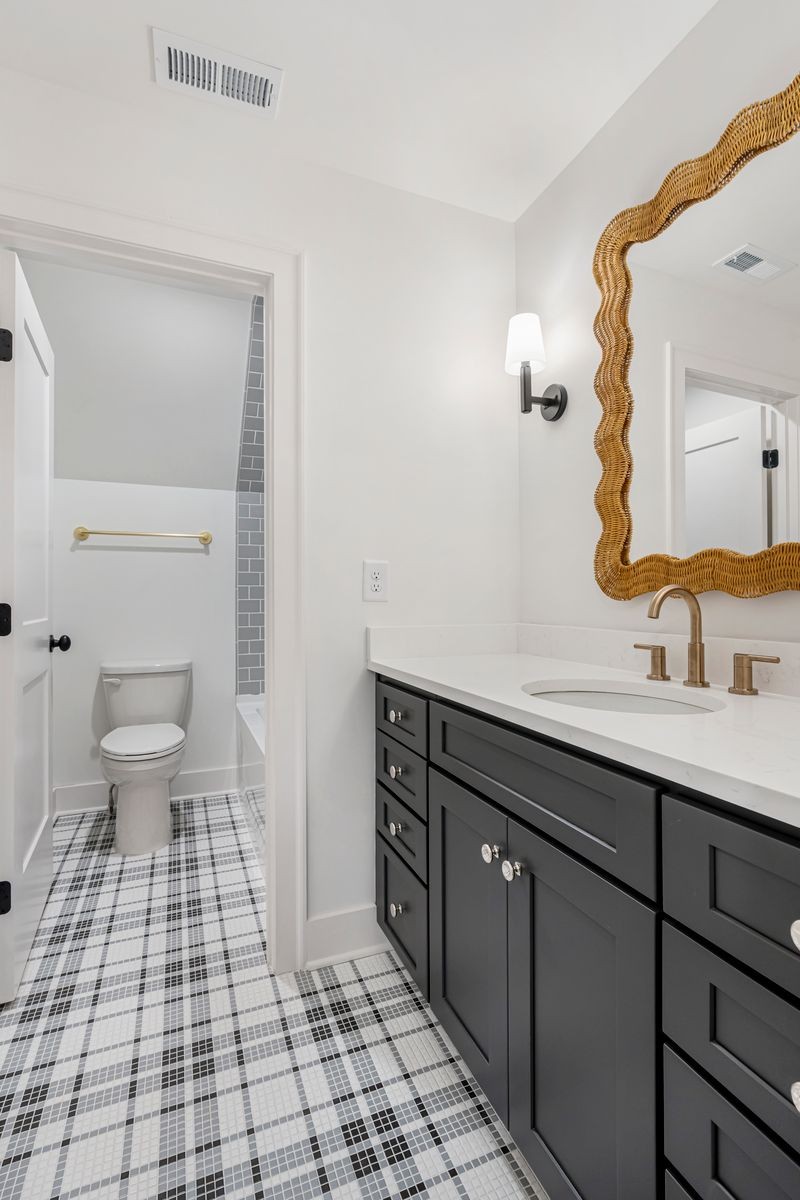 307 Oak Street Lebanon, TN 37087 - Photo 39 of 46 a bathroom with a sink and a mirror