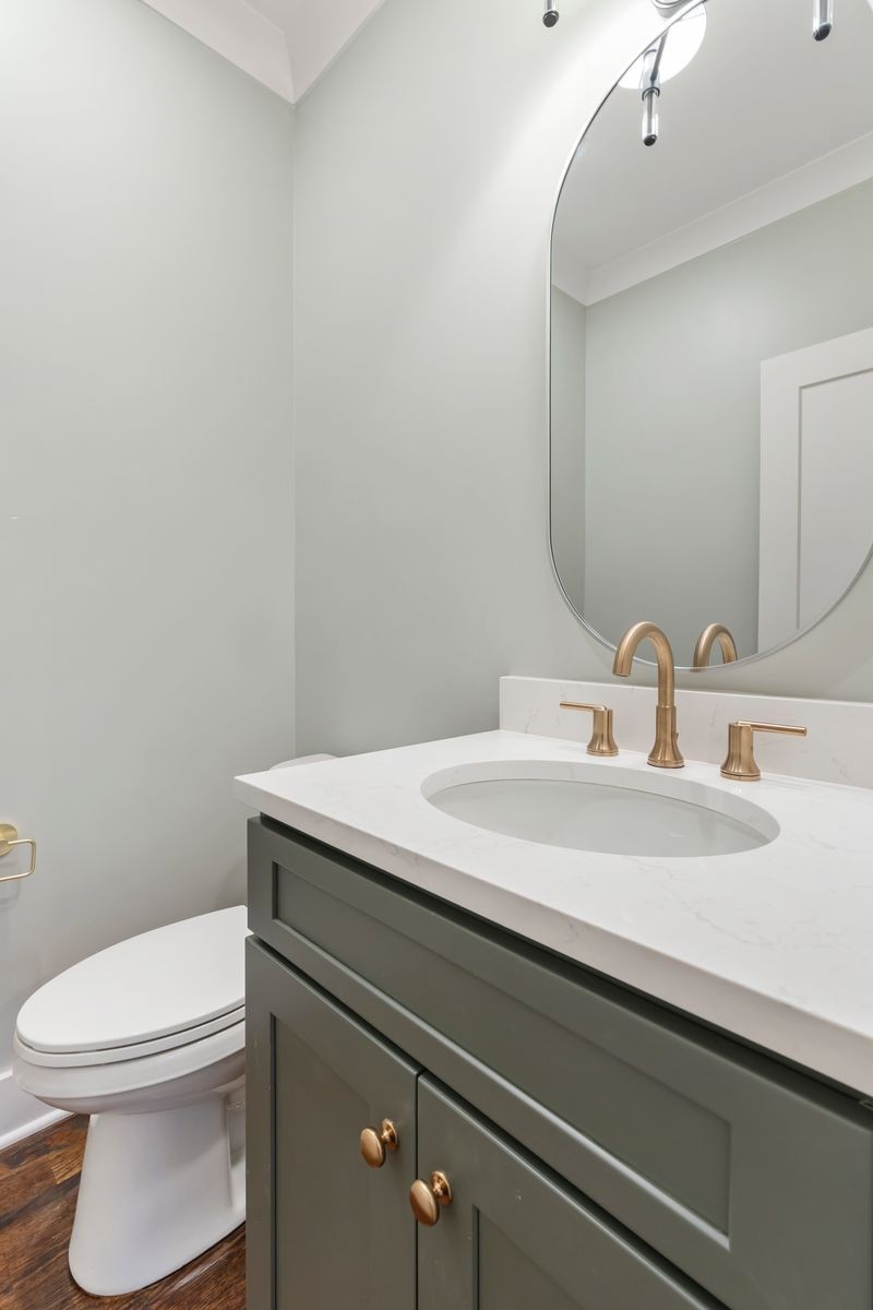 307 Oak Street Lebanon, TN 37087 - Photo 45 of 46 a bathroom with a sink a toilet and a mirror