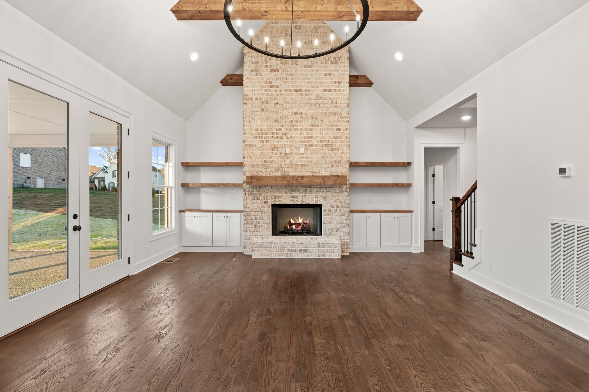 307 Oak Street Lebanon, TN 37087 - Photo 10 of 46 a view of a room with wooden floor and fireplace