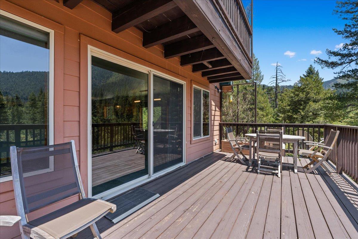 200 Craycroft Ridge Road Downieville, CA 95936 - Photo 12 of 39 a view of a balcony with chairs and wooden floor